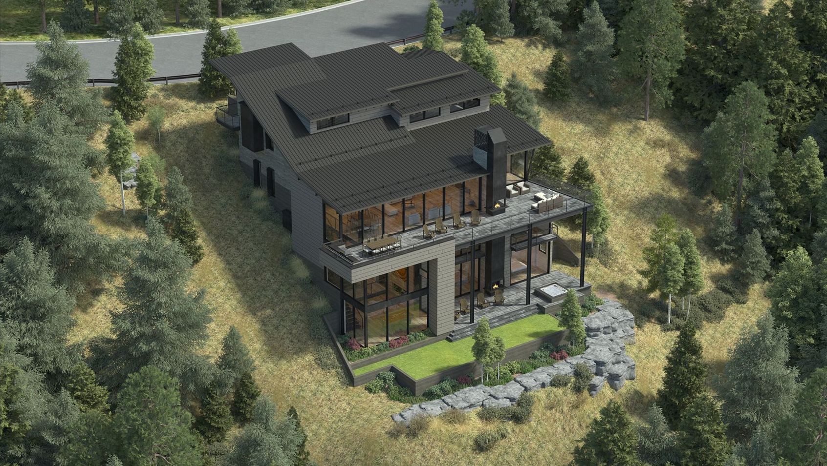 An aerial view of a large house in the middle of a forest.