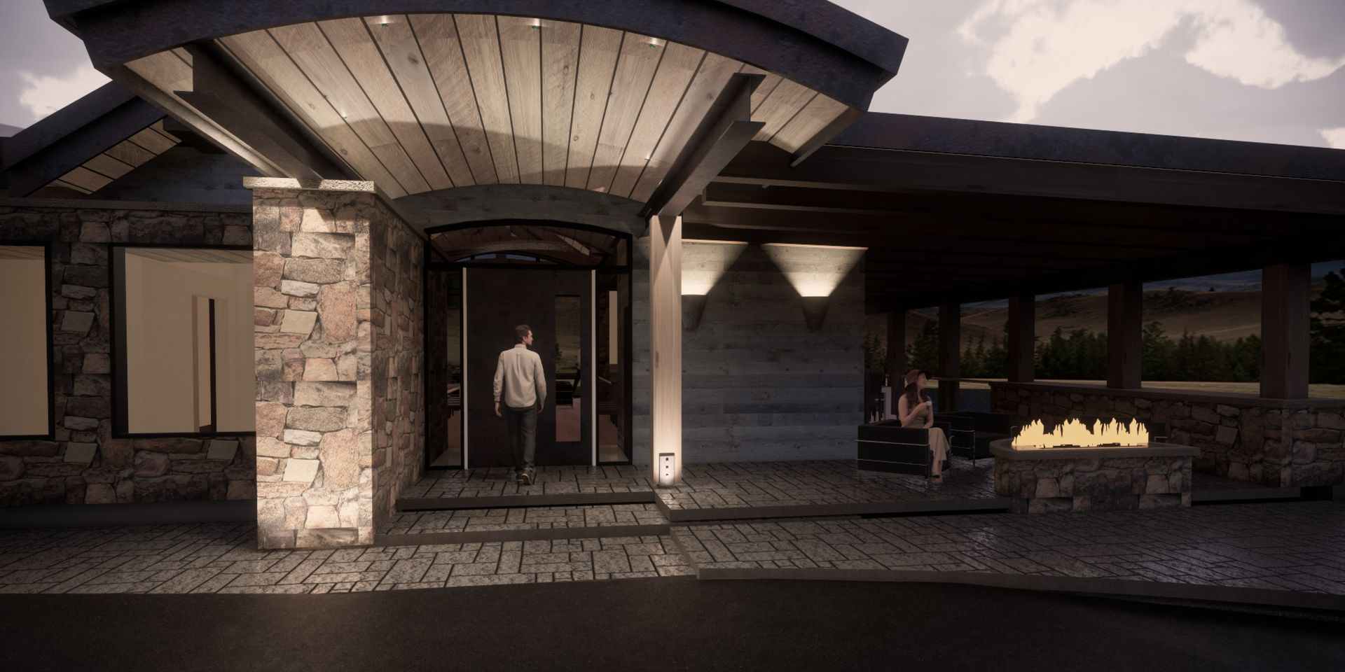 A man is walking into a house with a fire pit in front of it.