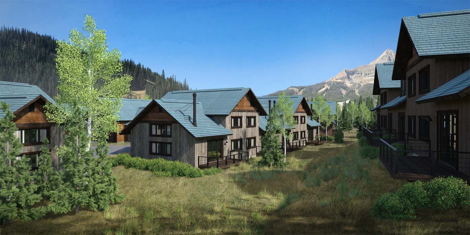 A row of houses with a mountain in the background