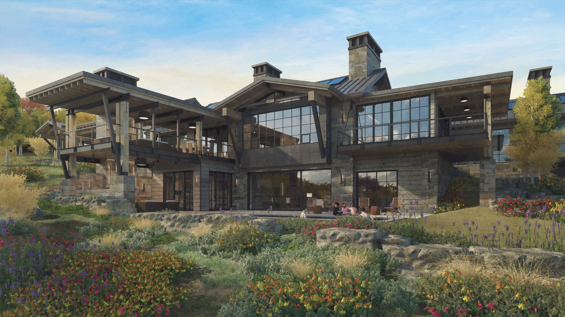 A large house with a lot of windows is sitting on top of a hill.