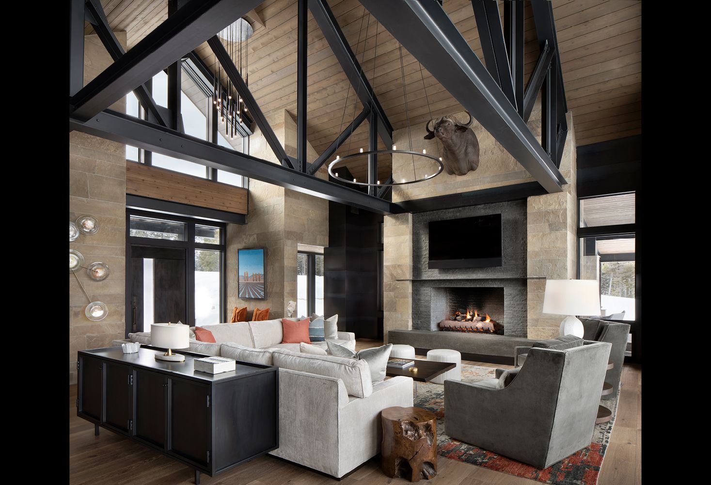 A living room with a fireplace and lots of furniture