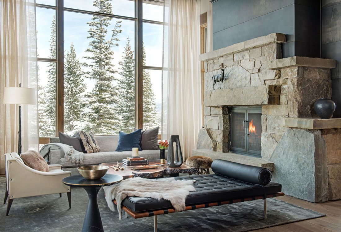 A living room filled with furniture and a fireplace.