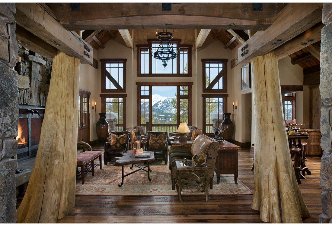 A living room with a lot of furniture and a fireplace