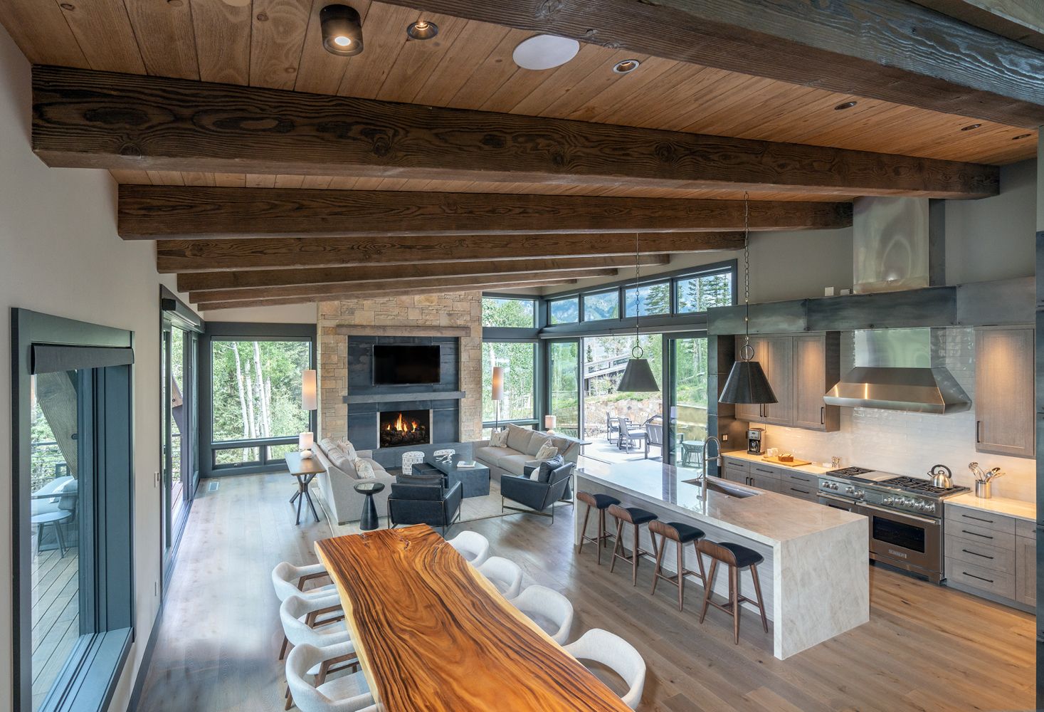 There is a large table in the middle of the room.