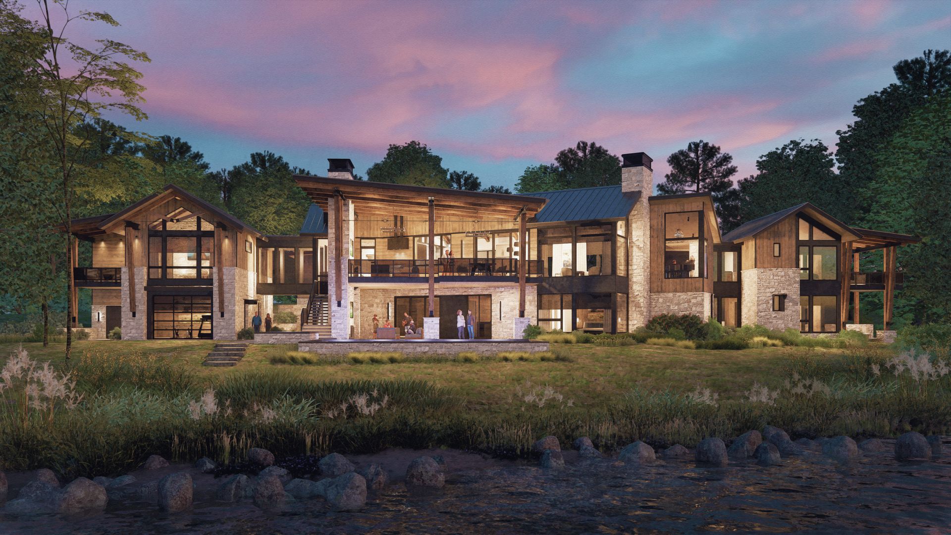 A large house is sitting on top of a lush green field next to a river.