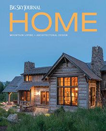 A large wooden house is on the cover of a magazine.