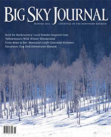 The cover of the big sky journal shows a snowy forest