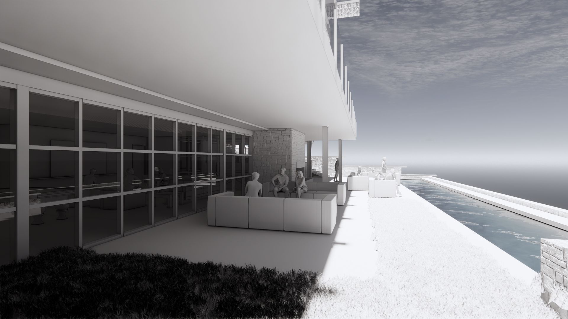 A black and white photo of a building with a view of the ocean.