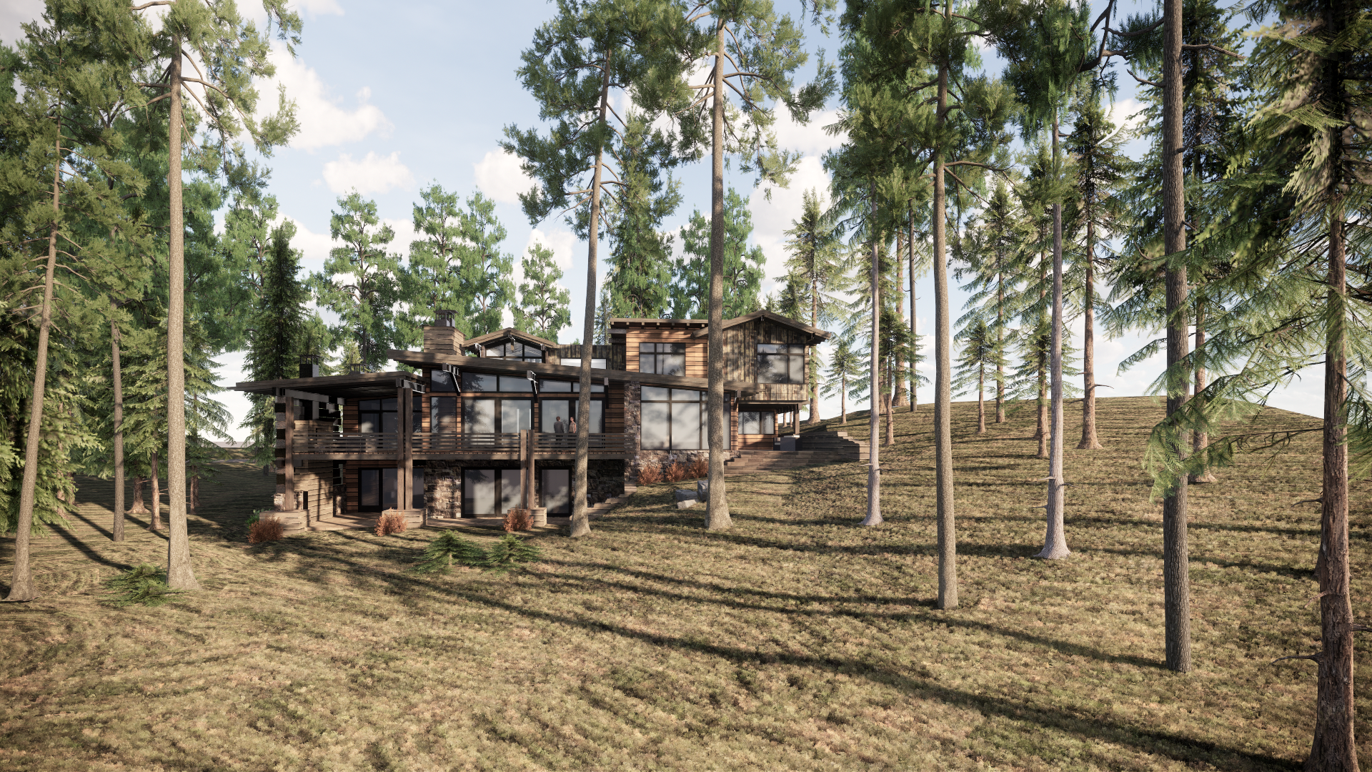 A large house is sitting on top of a hill in the middle of a forest.