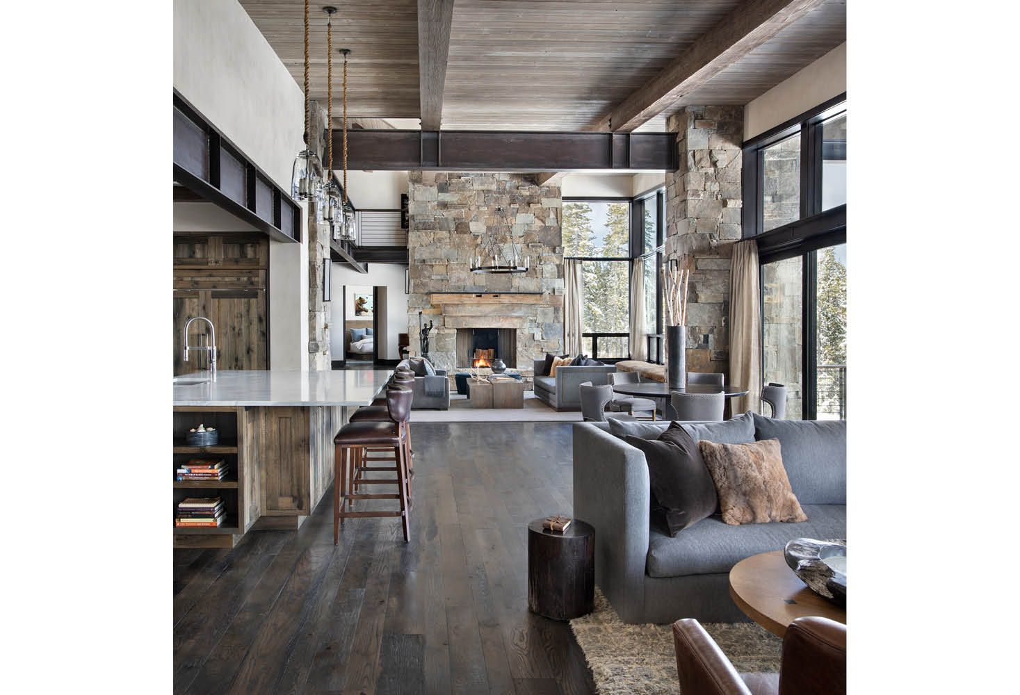 A living room filled with furniture and a fireplace.