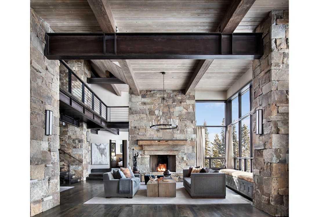 A living room filled with furniture and a fireplace.