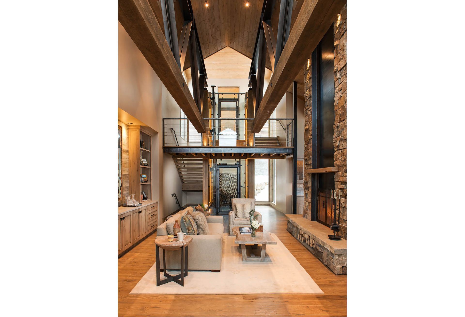 A living room filled with furniture and a fireplace.