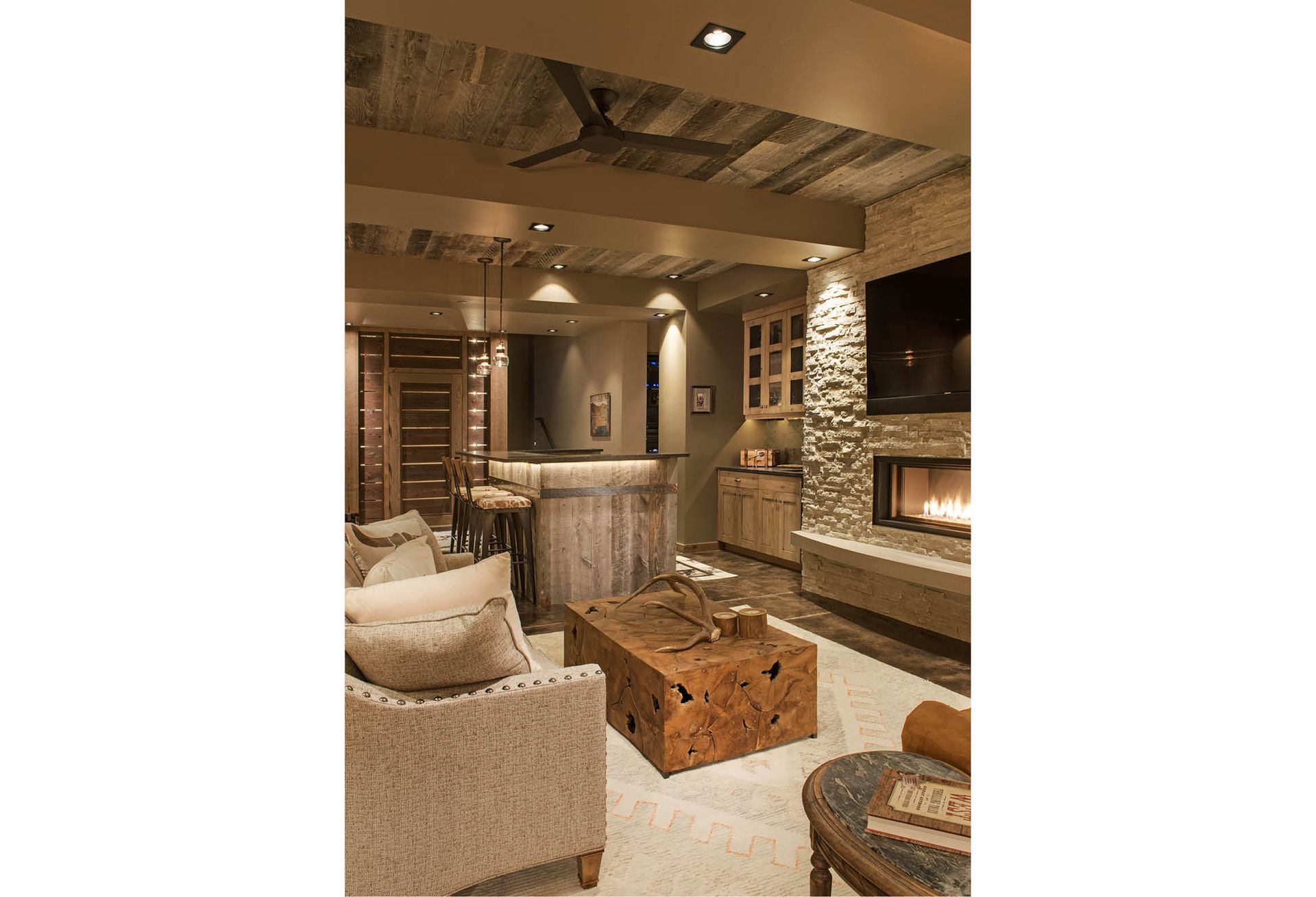 A living room filled with furniture and a fireplace.