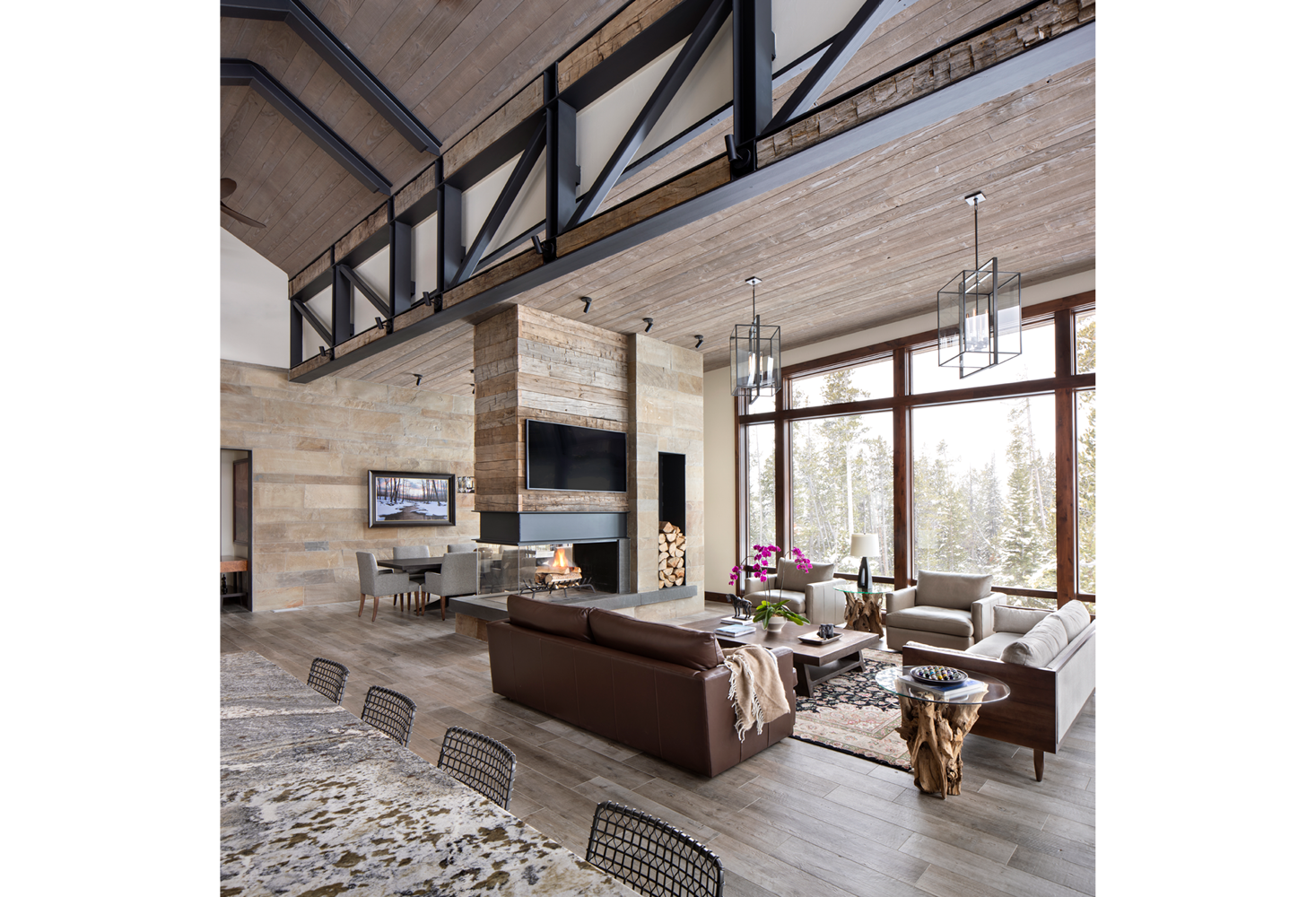 A living room filled with furniture and a fireplace.