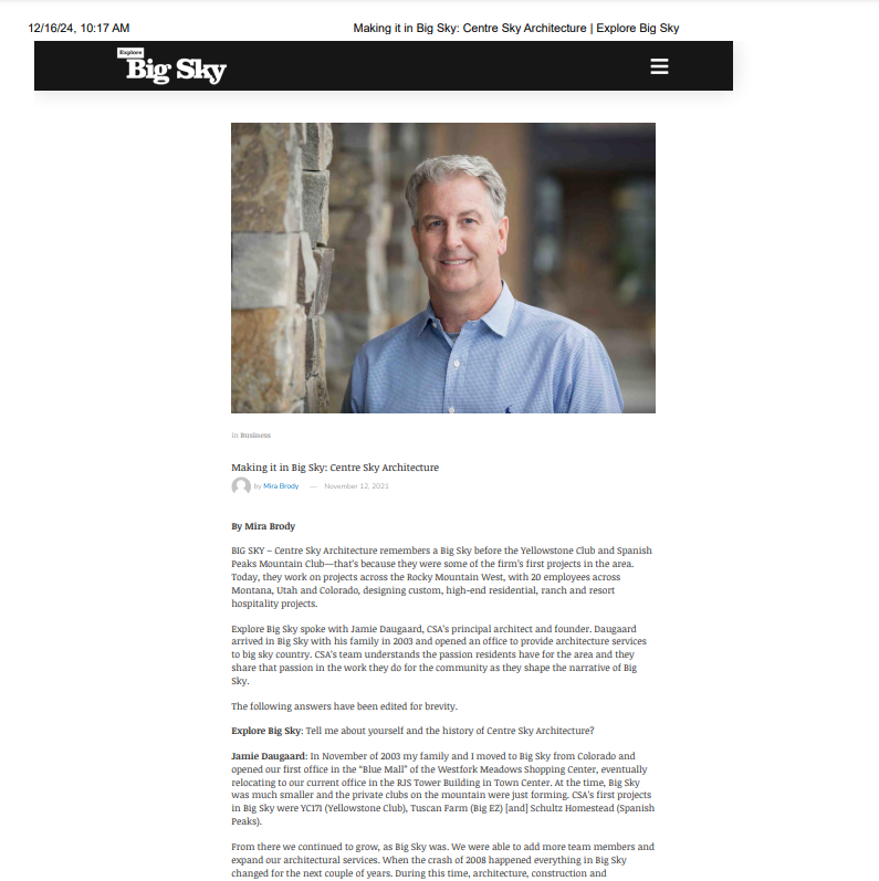 A large house sits on top of a snow covered hill