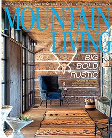The cover of mountain living magazine is a living room with a chair and a rug.