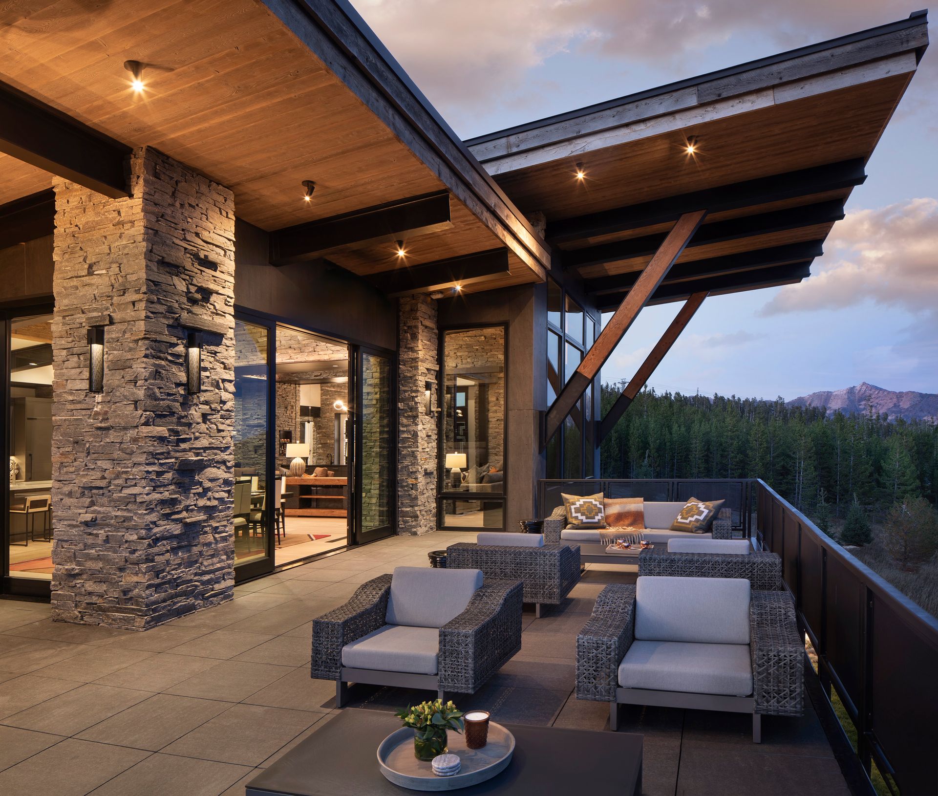 An artist 's impression of a balcony with chairs and a couch