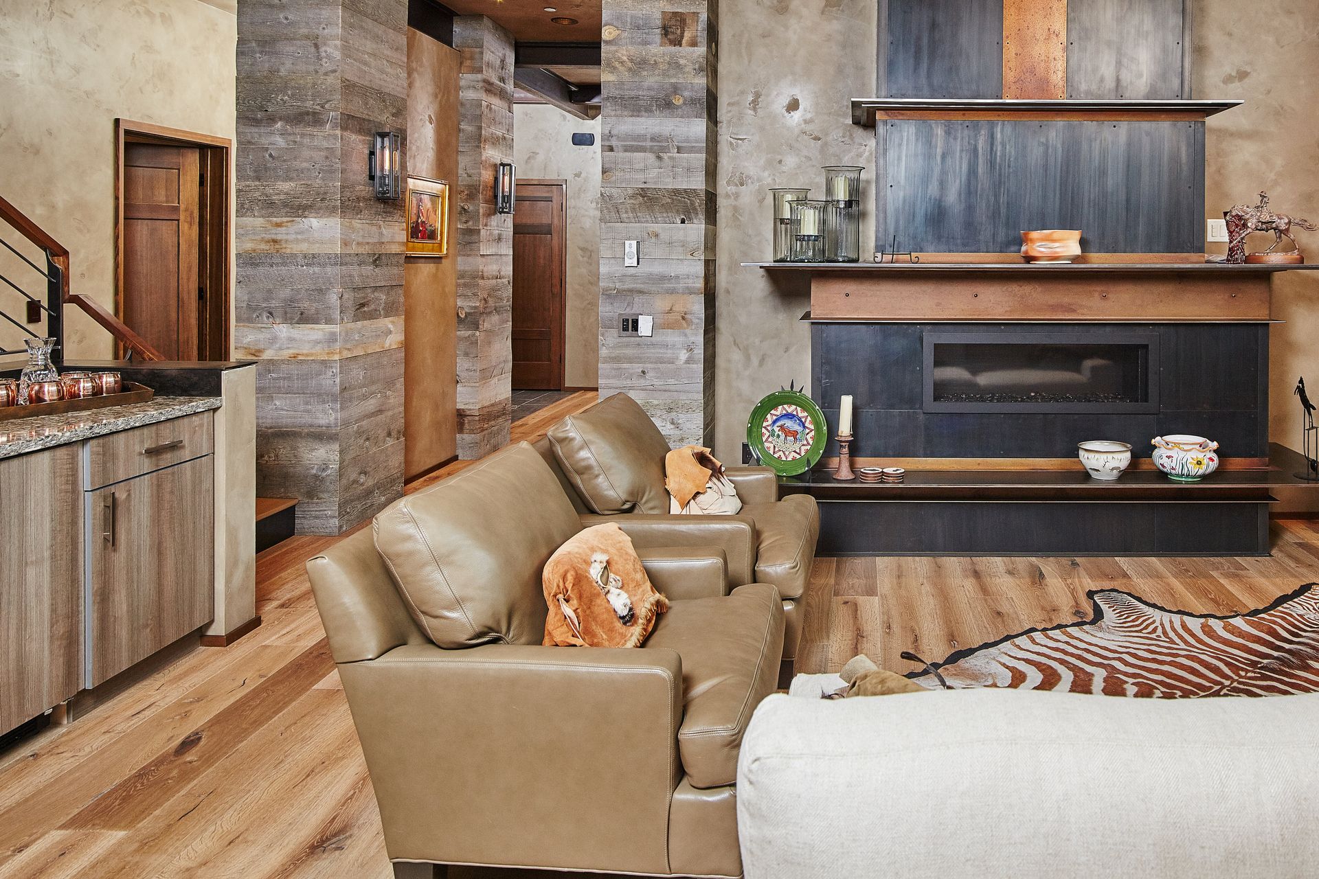 A living room filled with furniture and a fireplace.