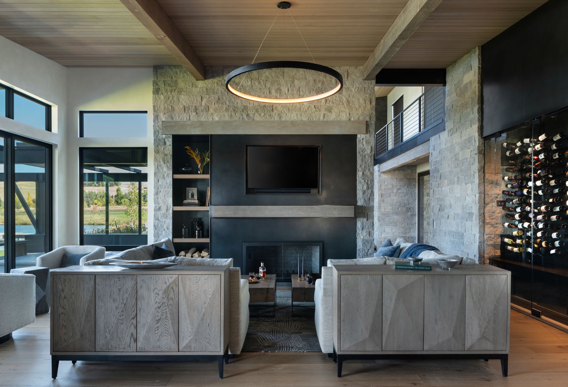 A living room filled with furniture and a fireplace.