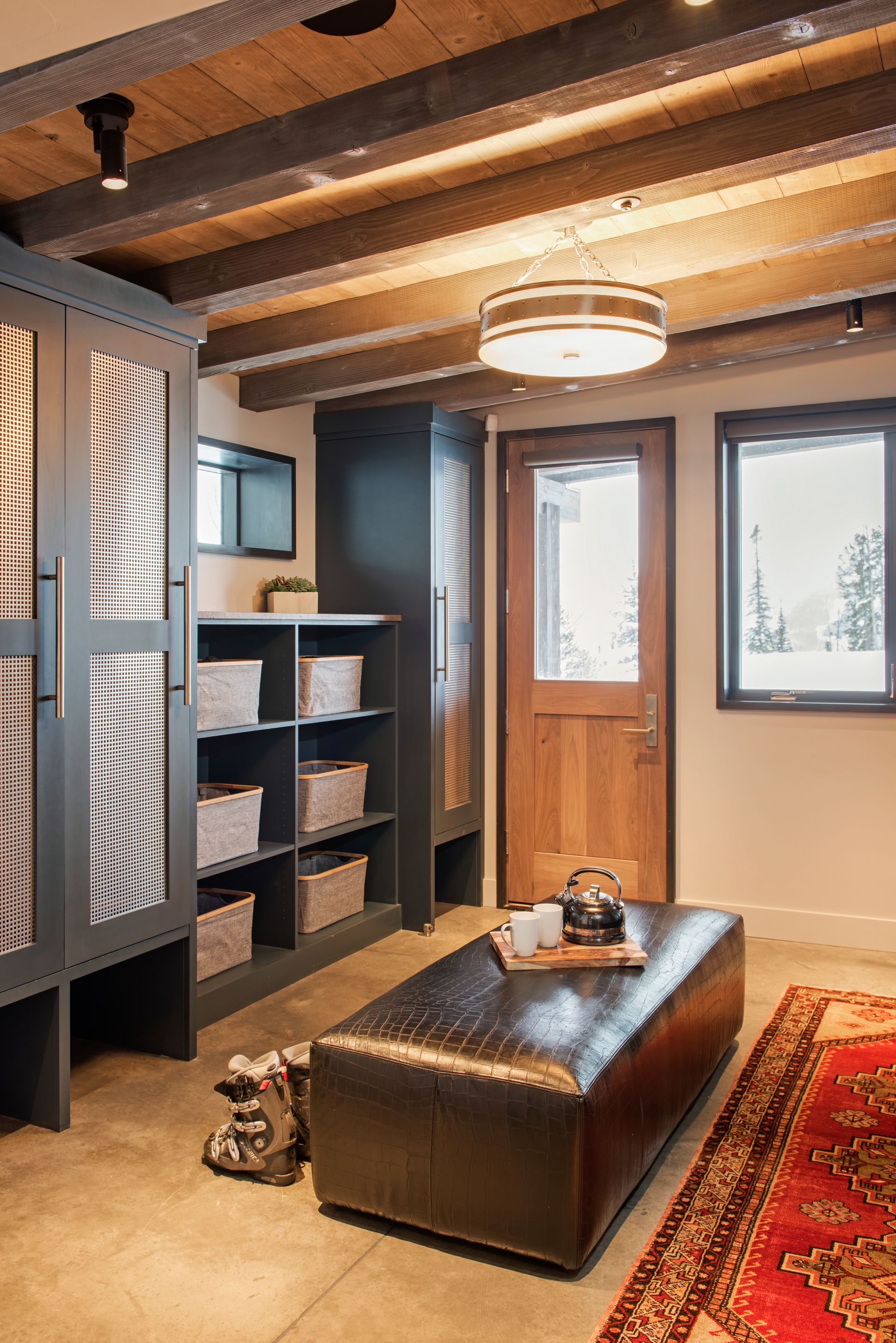 There is a coffee table in the middle of the room.