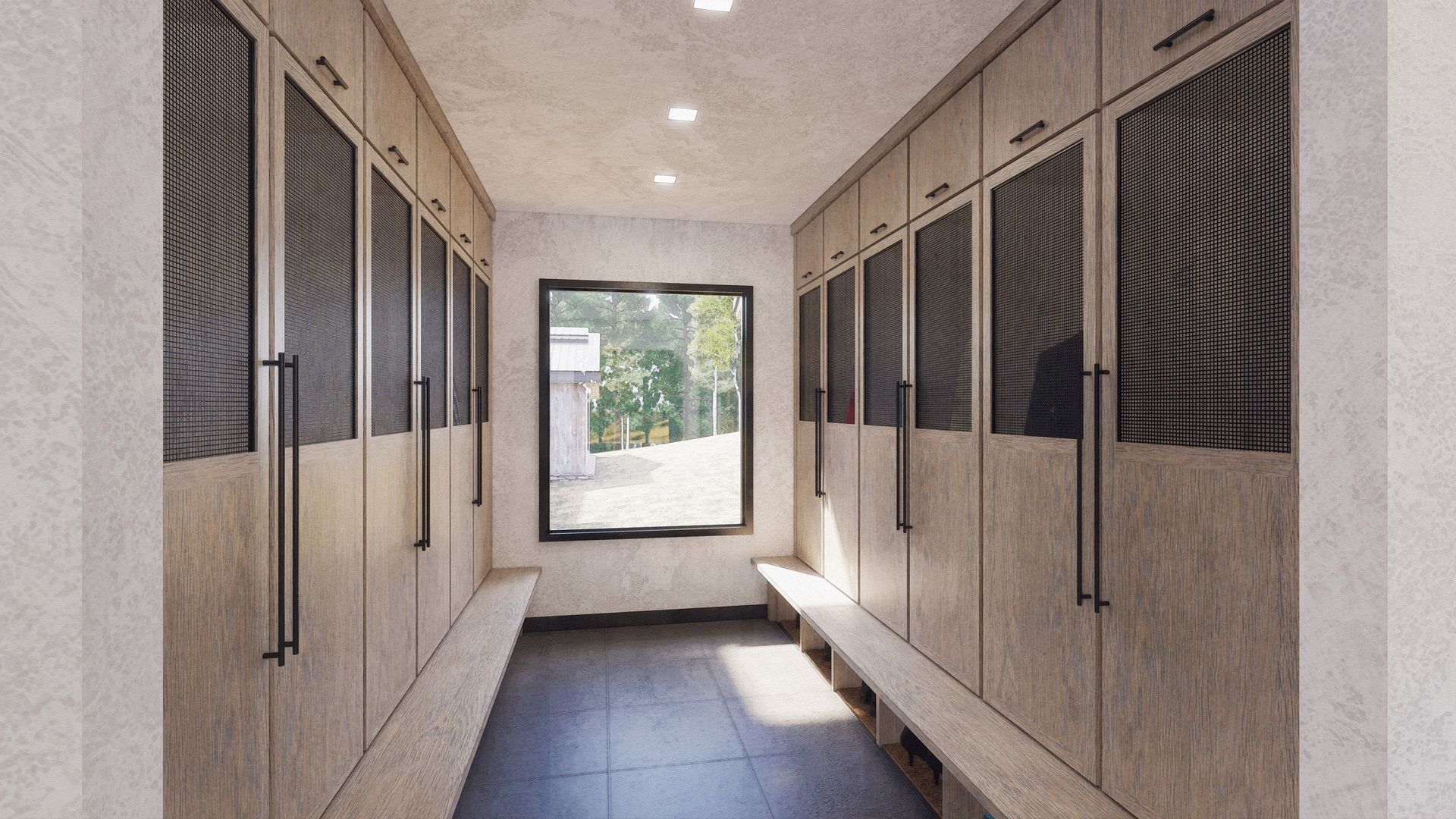 A hallway with a lot of cabinets and a window.