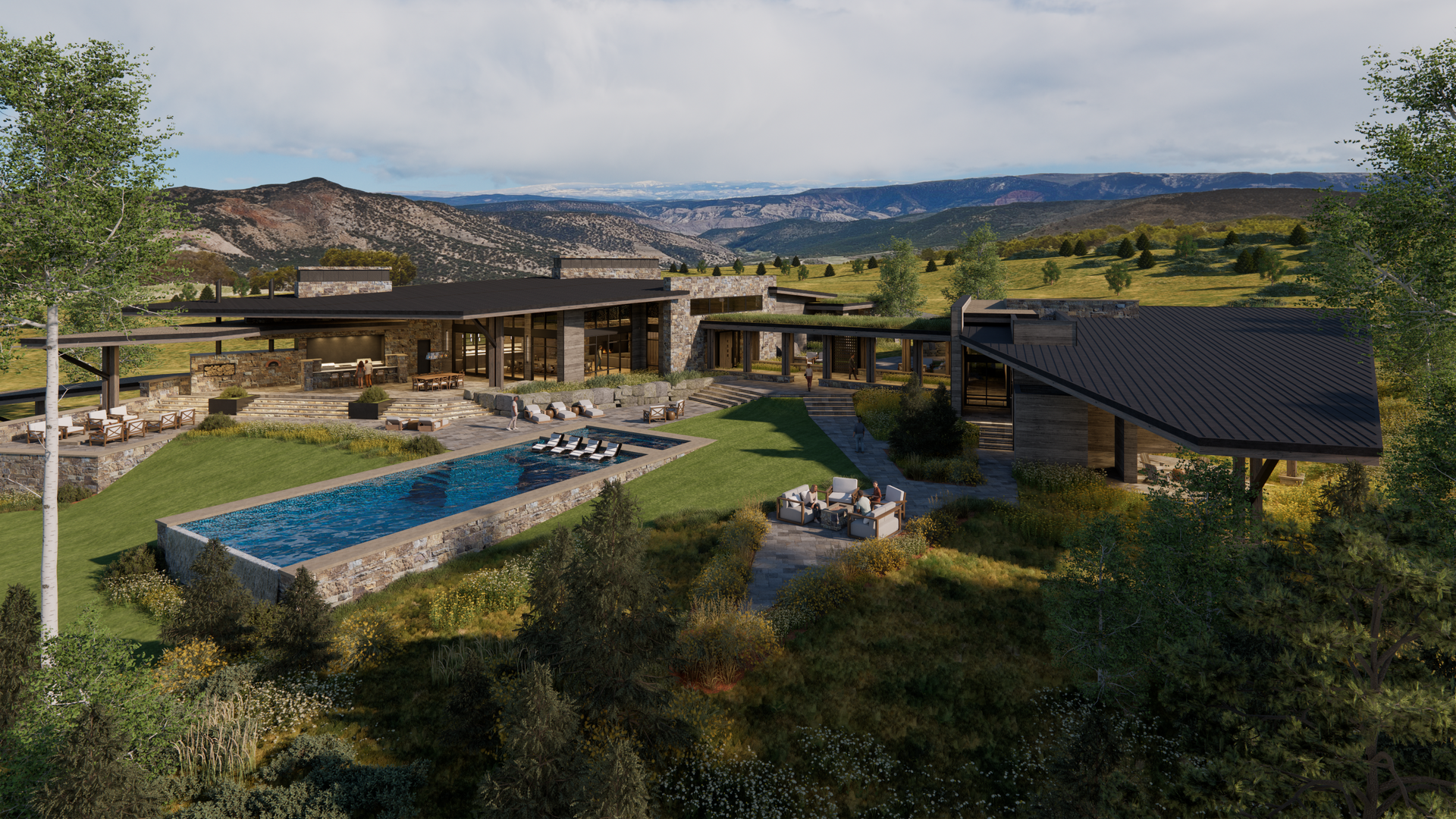An aerial view of a large house with a swimming pool in the middle of a field.