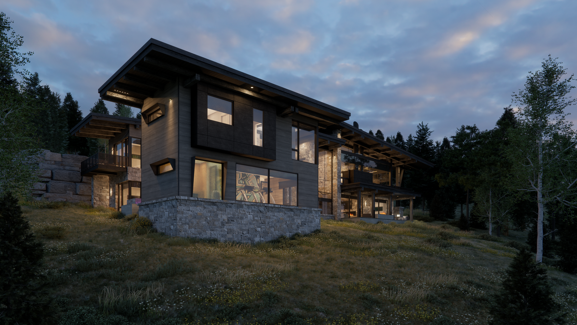 A large house is sitting on top of a hill in the middle of a forest.