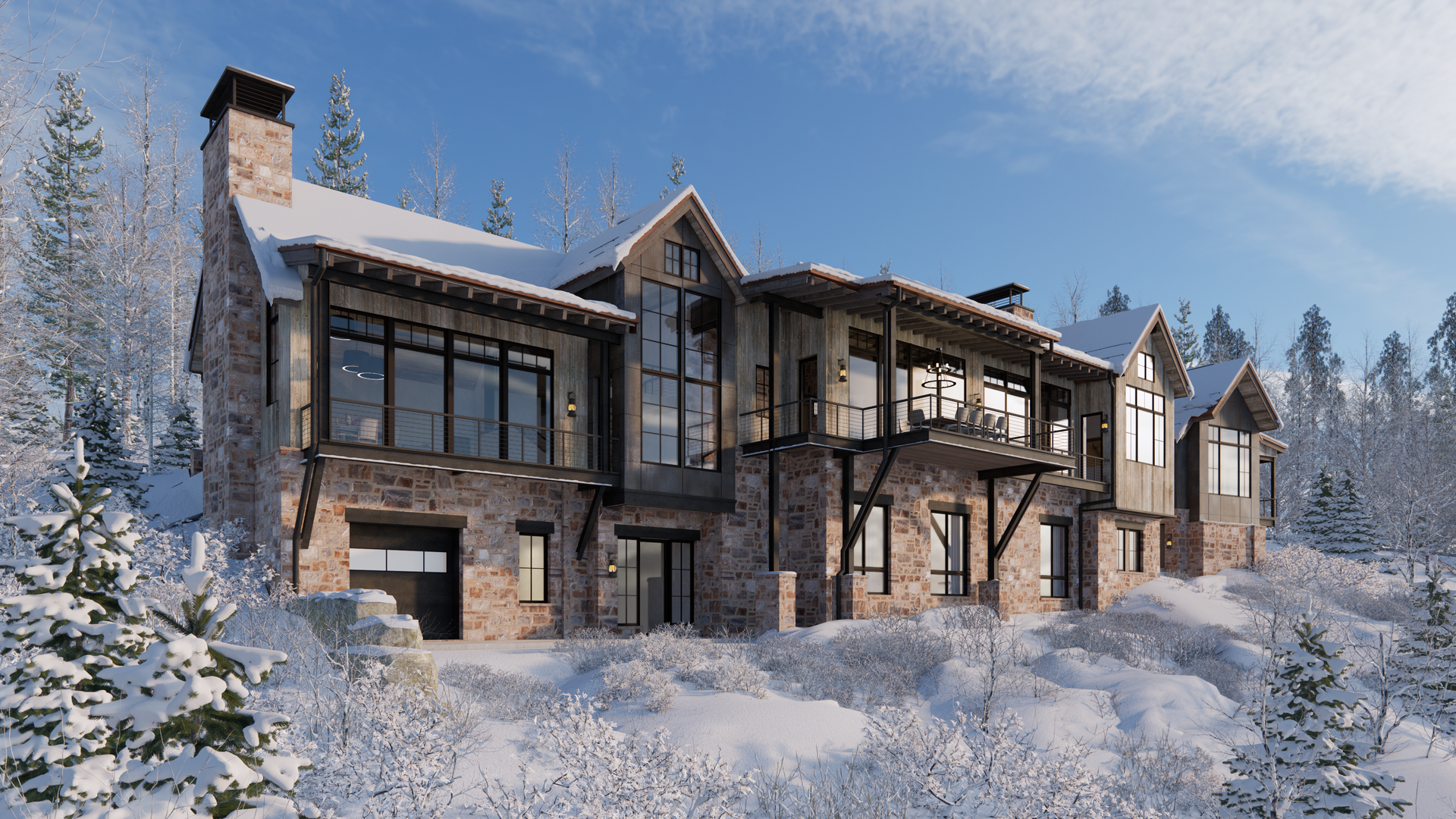 A large house with a lot of windows is surrounded by snow covered trees.