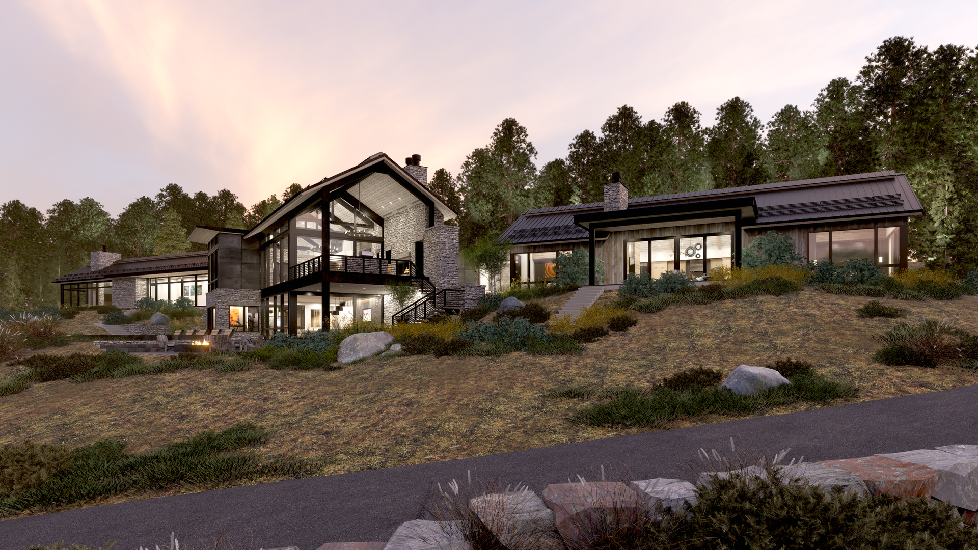 A large house is sitting on top of a hill in the middle of a forest.