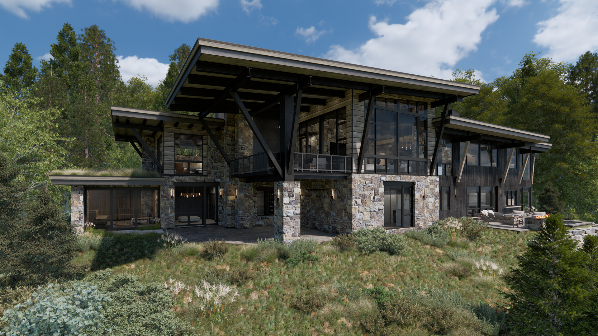 A large house is sitting on top of a hill in the middle of a forest.