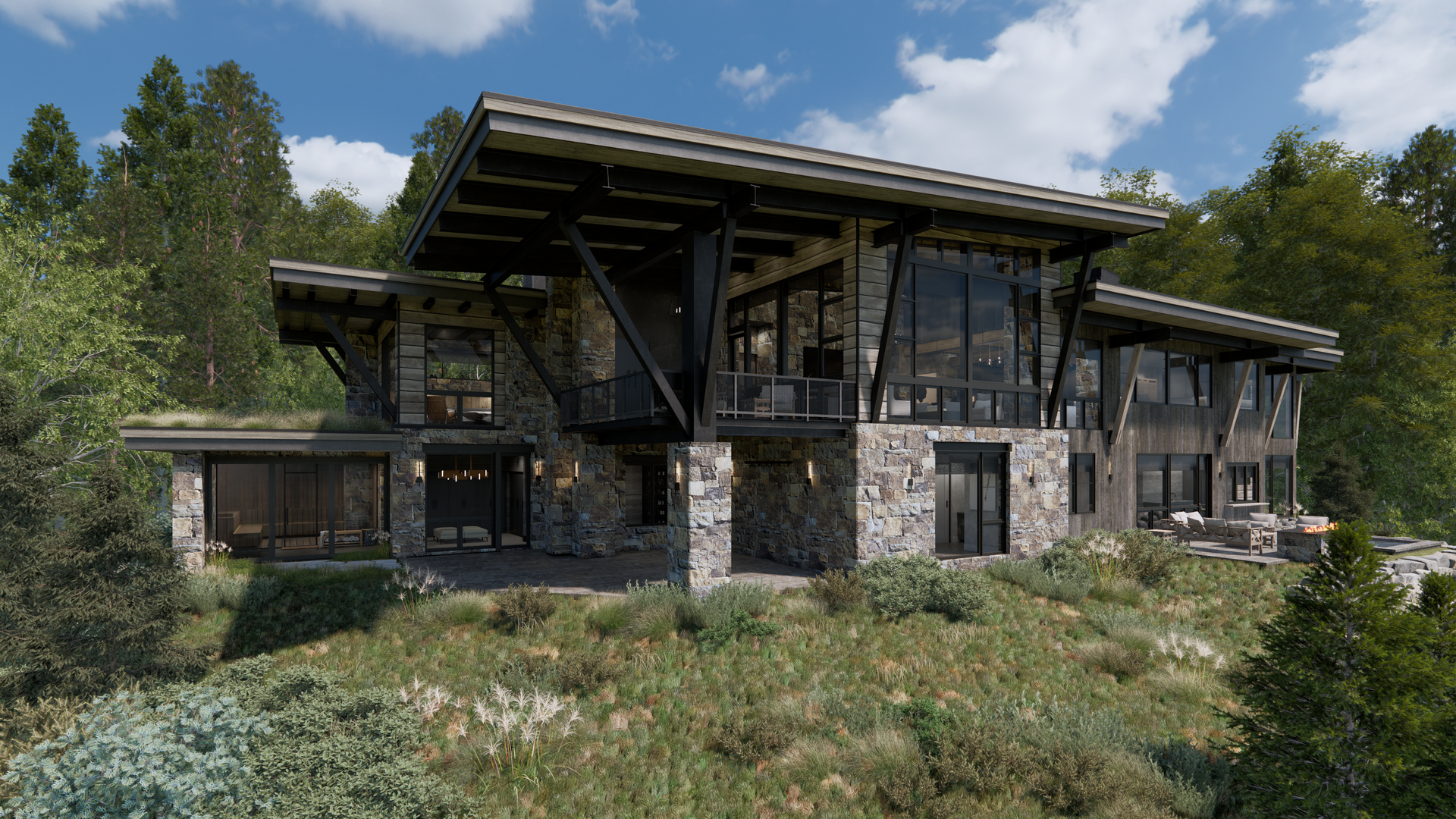 A large house is sitting on top of a hill in the middle of a forest.