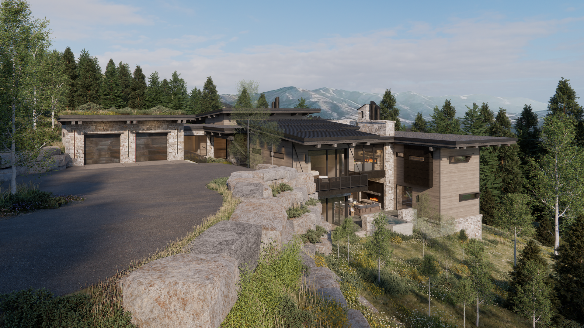 A large house is sitting on top of a hill in the middle of a forest.