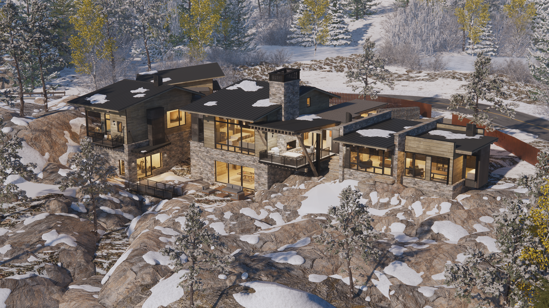 An aerial view of a large house in the middle of a snowy forest.