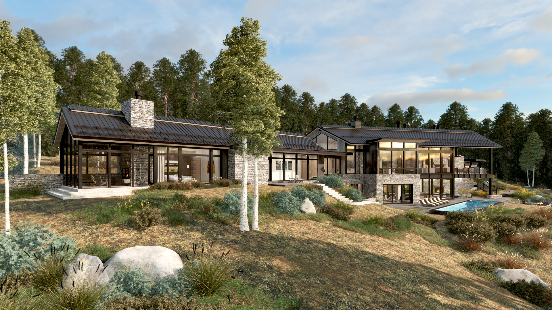 A large house is sitting on top of a hill in the middle of a forest.