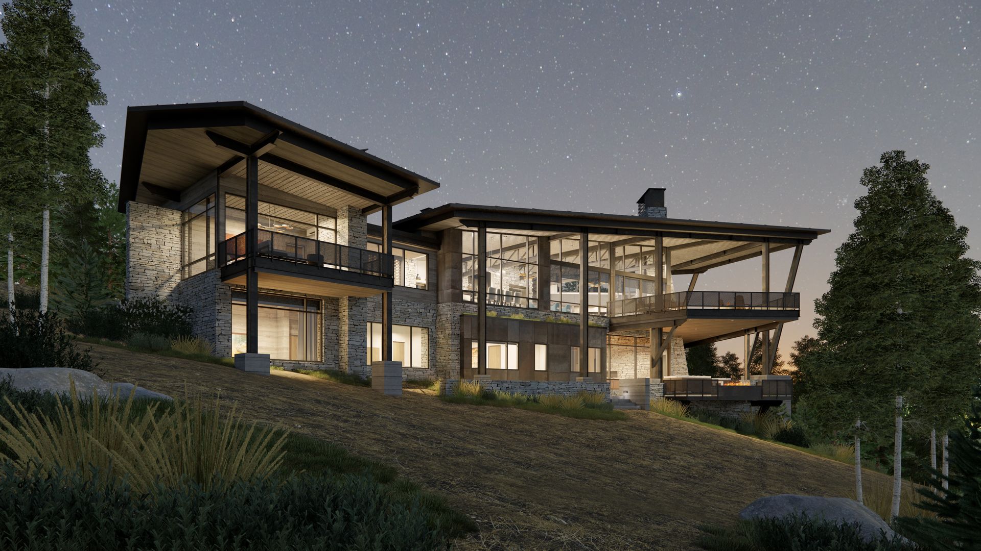 A large house is sitting on top of a hill at night.