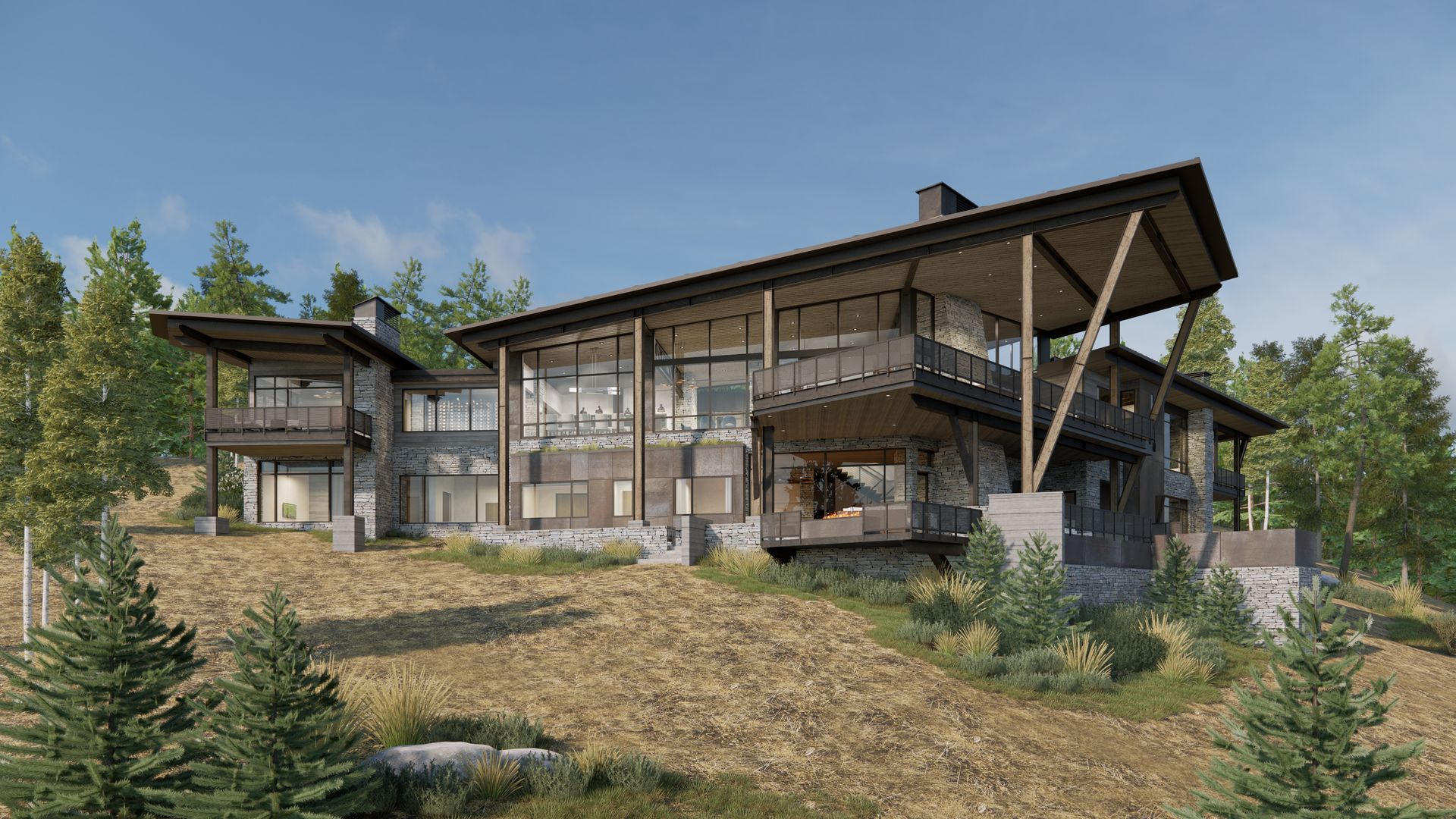 A large house is sitting on top of a hill in the middle of a forest.