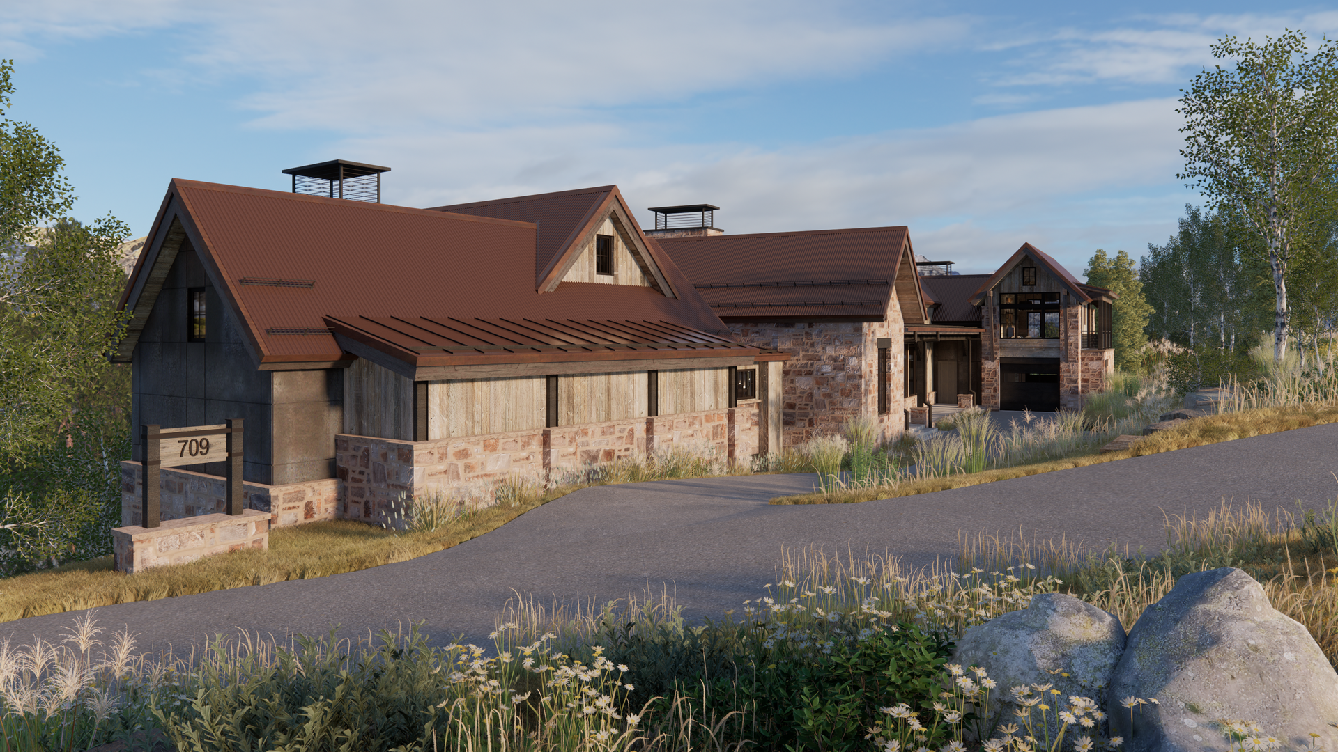 A large house is sitting on top of a hill next to a road.