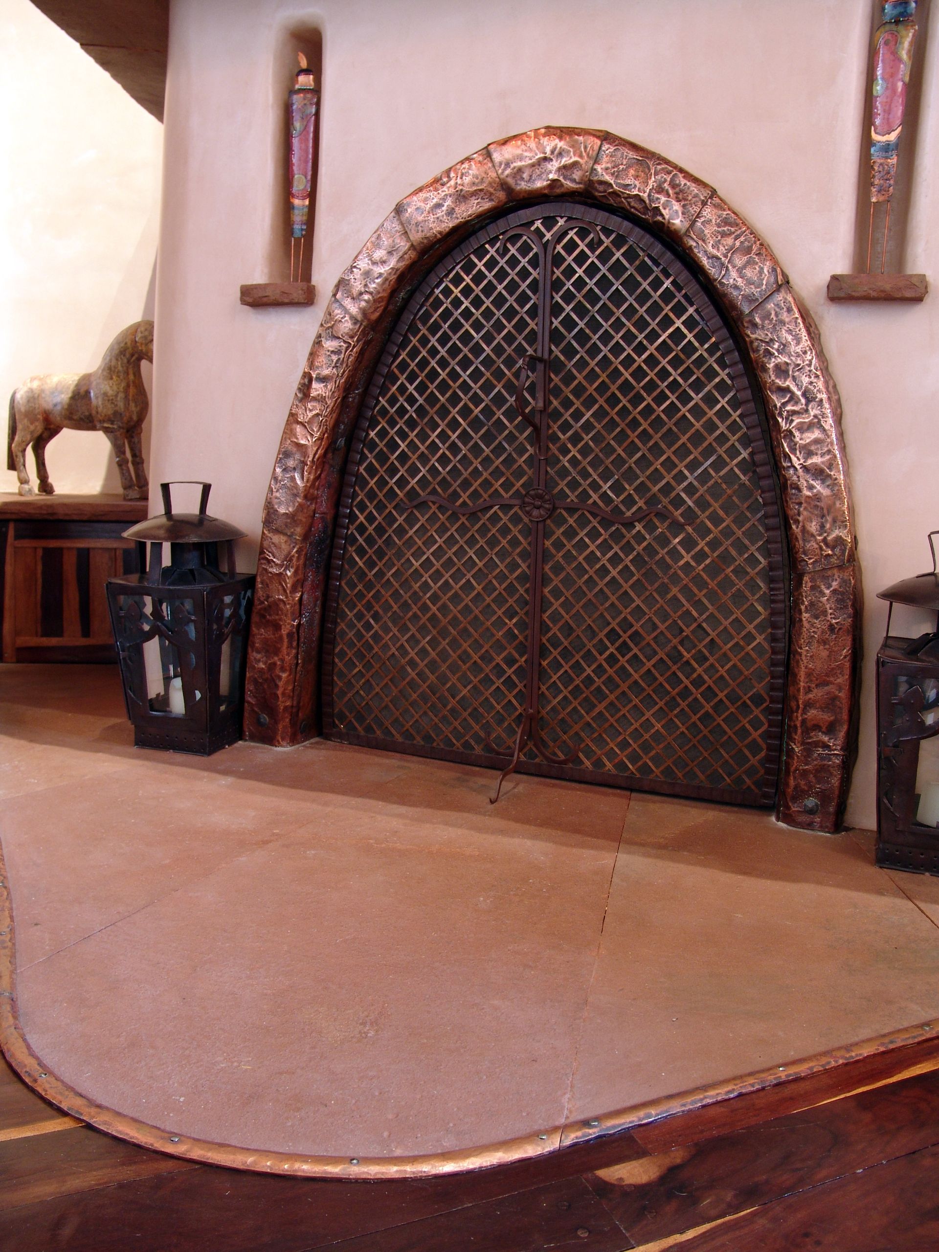 A door with a horse statue in the background