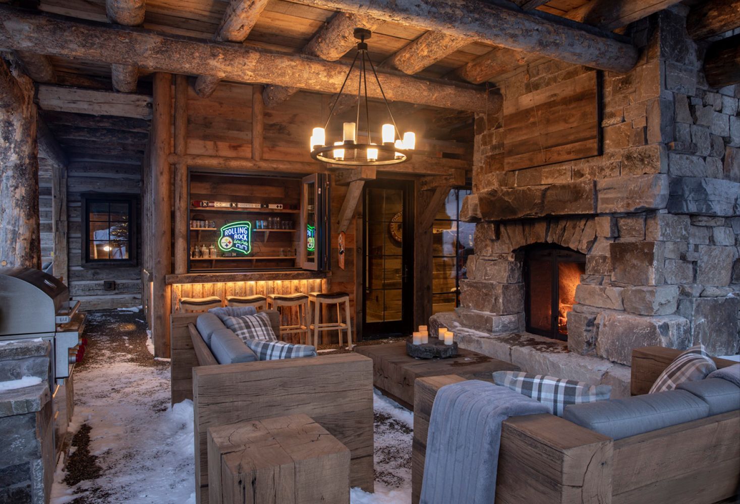 A living room filled with furniture and a fireplace.