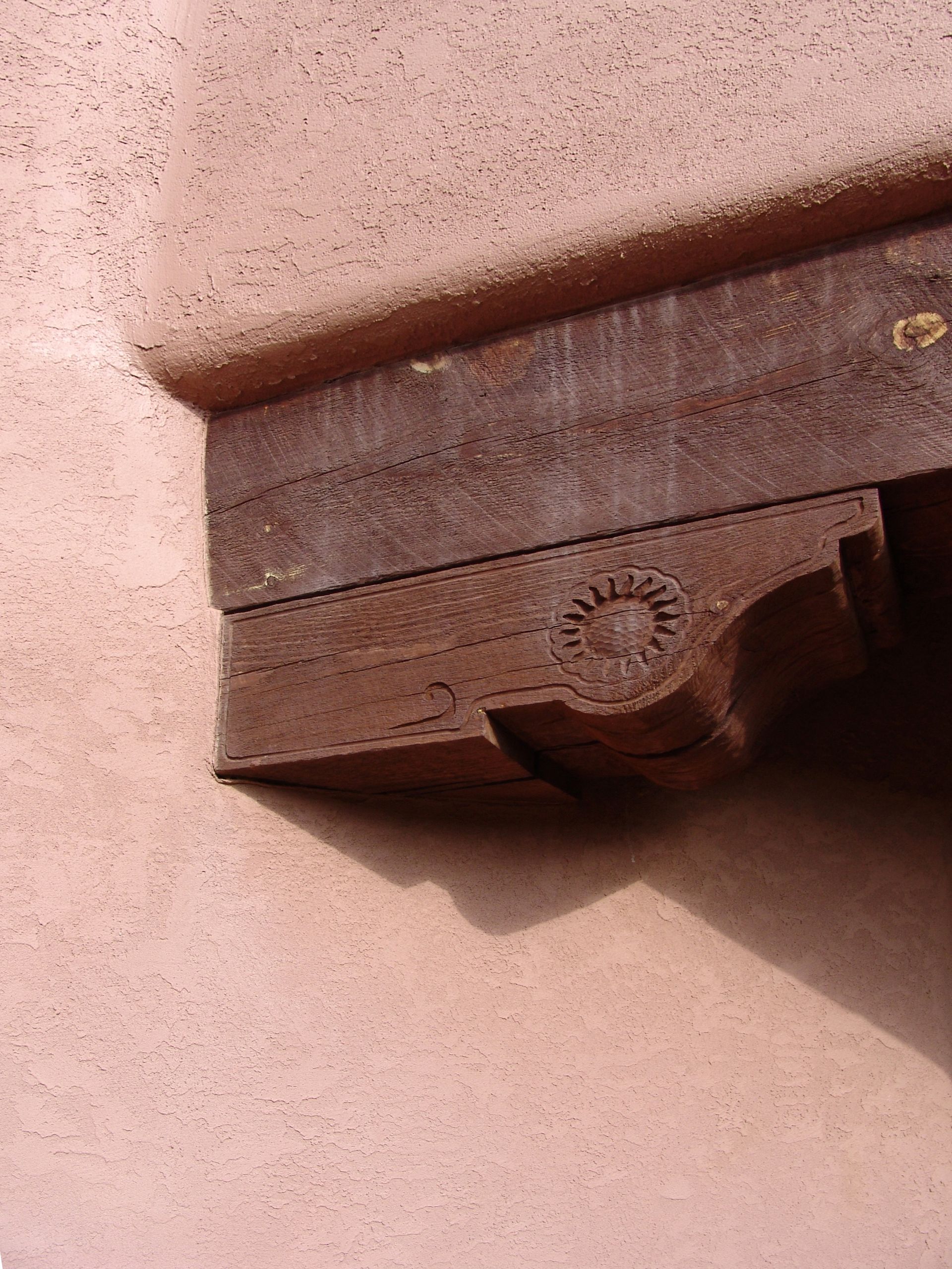 A close up of a piece of metal on a wall