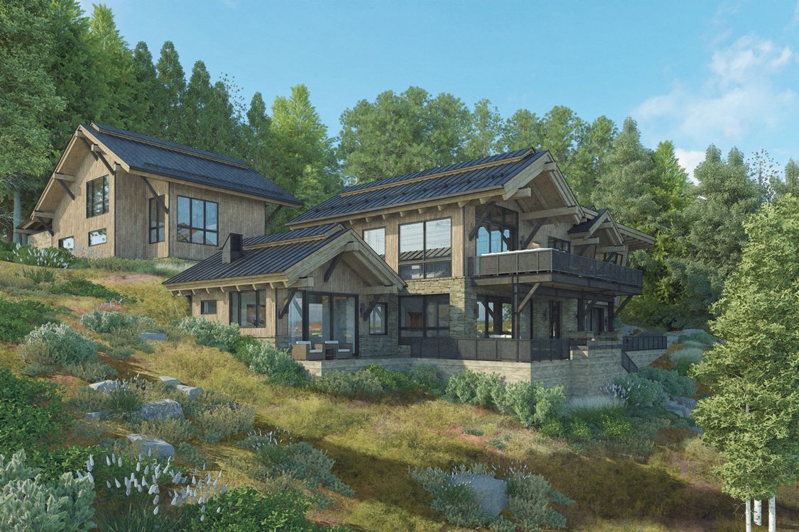 A large house is sitting on top of a hill surrounded by trees.