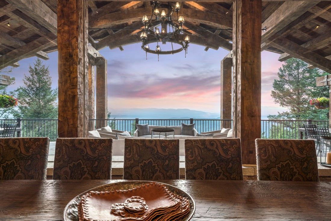 A dining room table with a plate of food on it.