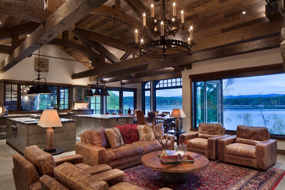 A living room with a lot of furniture and a chandelier