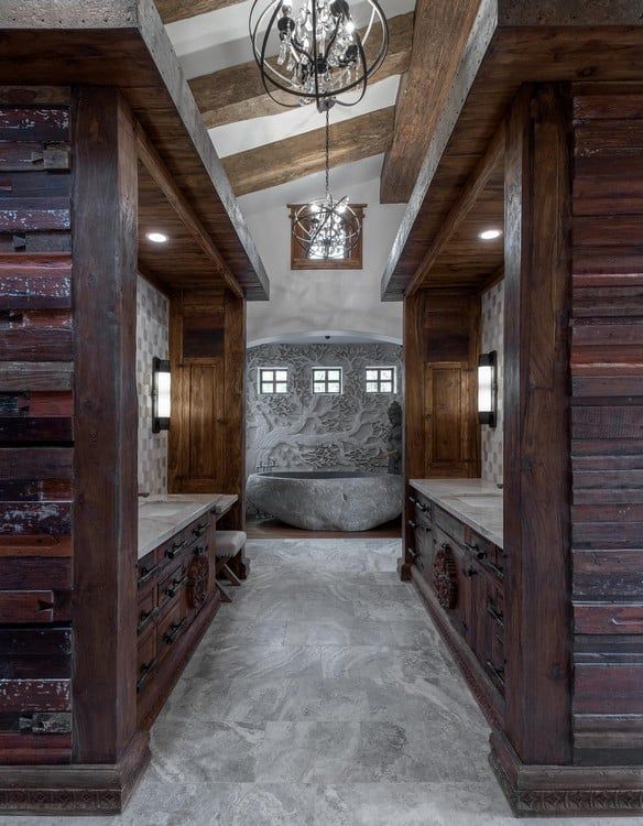 A long hallway with wooden walls and a bathtub in the middle