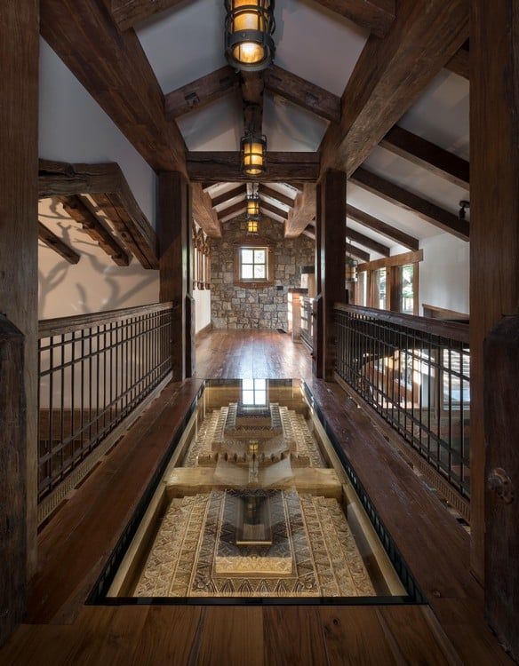 A hallway with a fountain in the middle of it