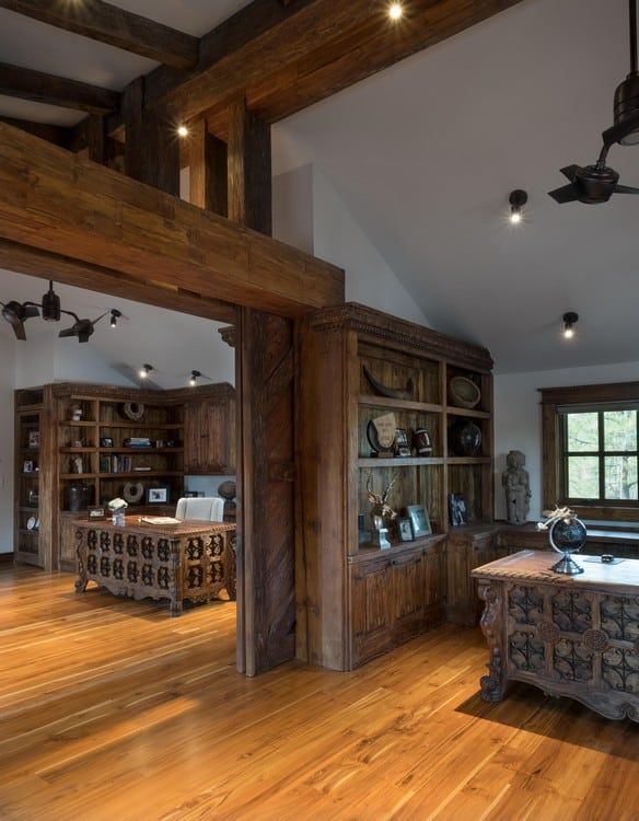 A living room with hardwood floors and a ceiling fan