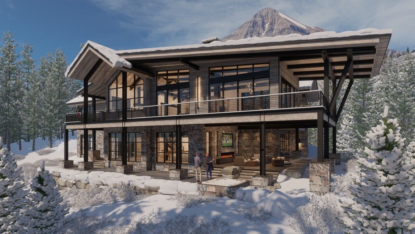 A large house with a mountain in the background is surrounded by snow covered trees.