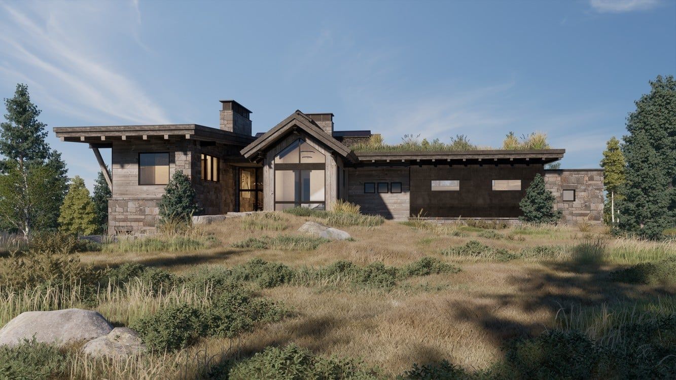 A large house is sitting in the middle of a field surrounded by trees.