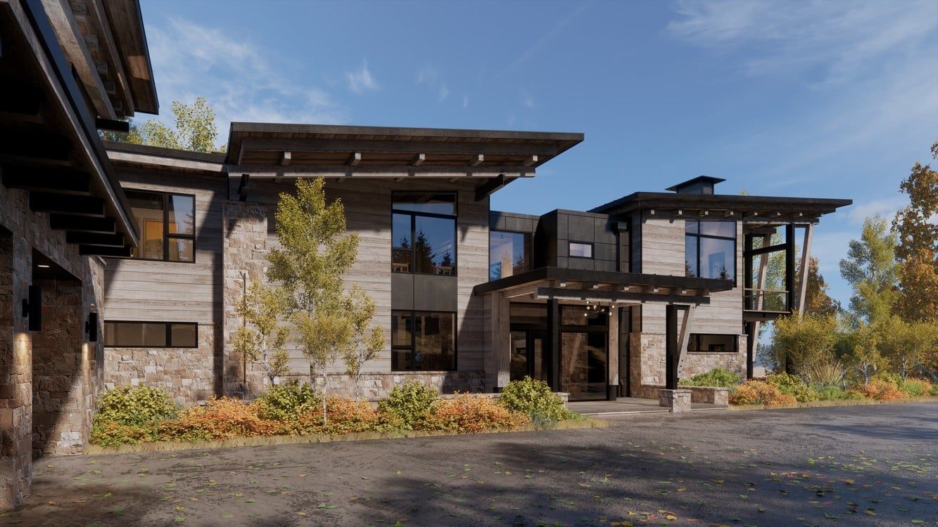 A large house with a lot of windows is sitting on top of a hill.