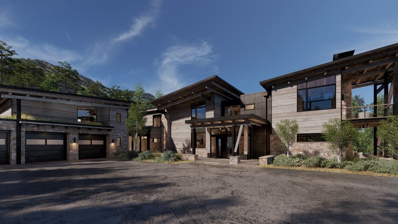 A large house with a lot of windows is sitting on top of a hill.